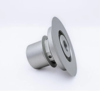 Turned aluminium part with a flange and a sleeve