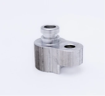 Milled aluminium part with a sleeve