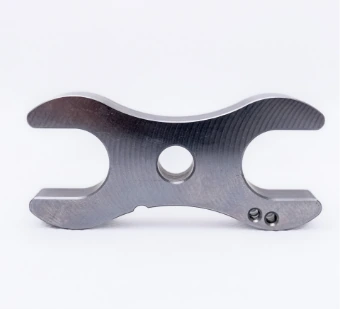 Milled flat aluminium part with a central hole