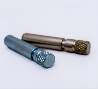 Turned pins with knurling